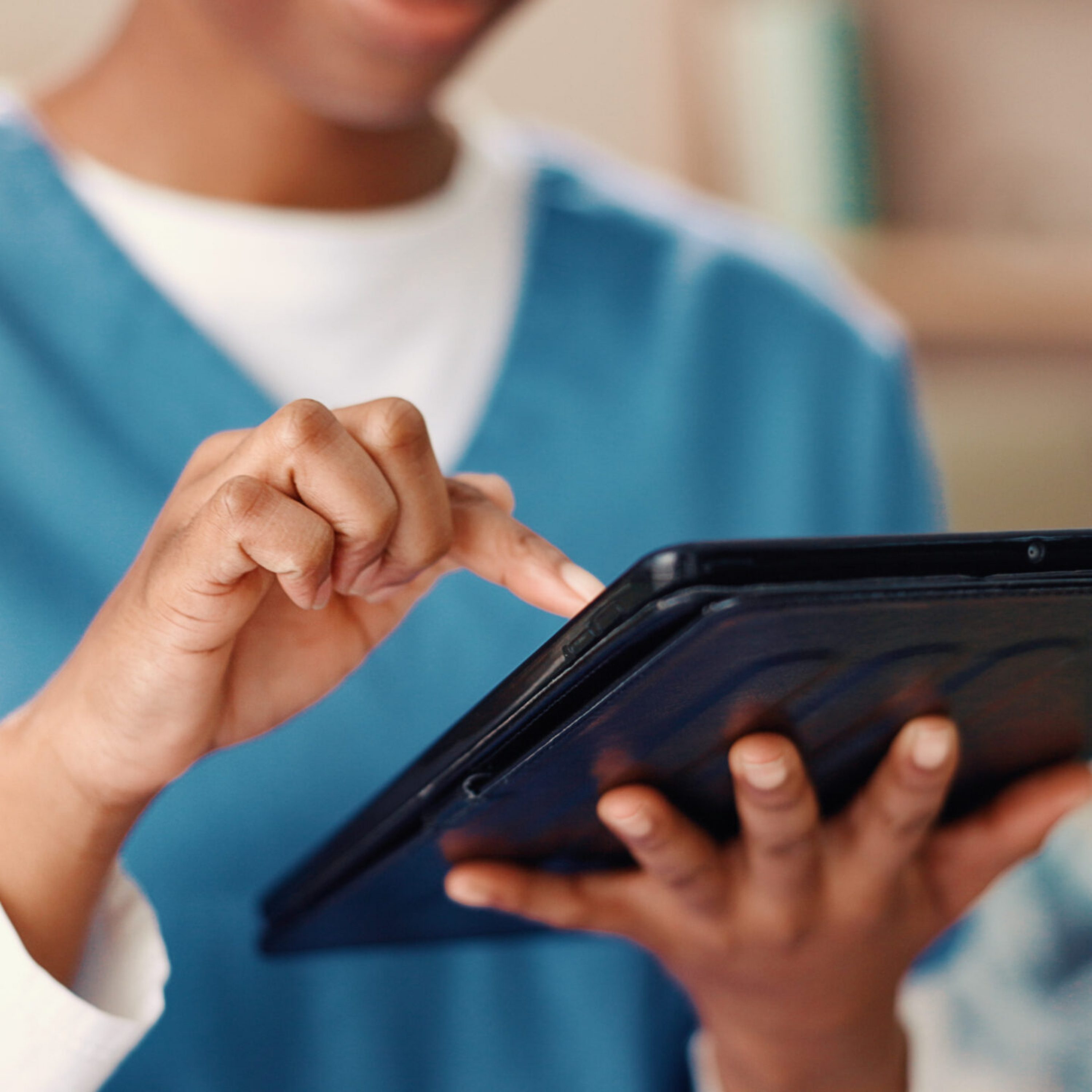 Woman, nurse and hands with tablet for research, medical or healthcare service at home. Closeup, female person or caregiver browsing with technology for telehealth app, results or schedule at house Woman, nurse and hands with tablet for research, medical or healthcare service at home. Closeup, female person or caregiver browsing with technology for telehealth app, results or schedule at house.